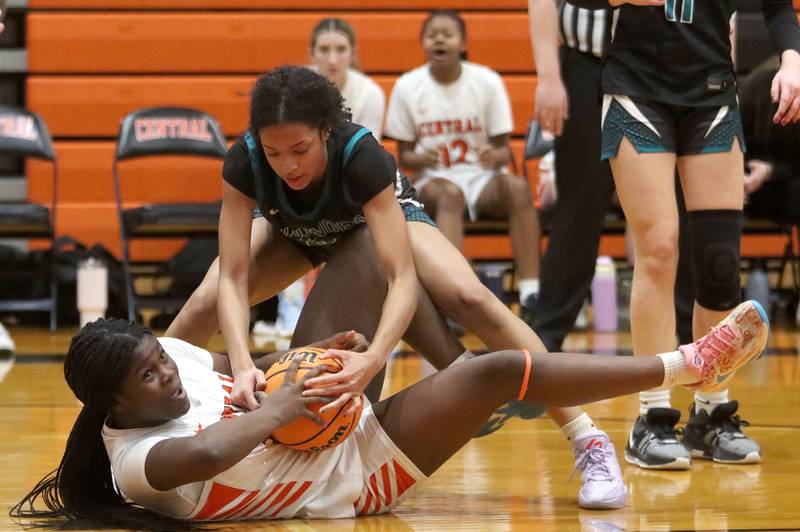Crystal Lake Central’s Pekun Bolarin, bottom, tussles with Woodstock North’s Jaida Collins in varsity girls basketball on Monday, Jan. 26, 2026, at Crystal Lake Central High School in Crystal Lake.