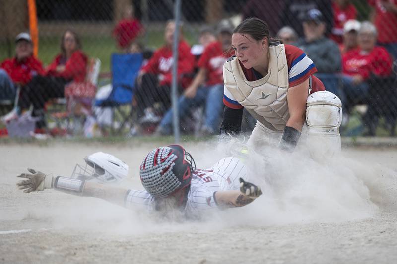 Fulton’s Belle Curley is tagged out at home by Morrison’s Allie Anderson Friday, May 22, 2026, at the Class 1A softball regional at Newman High School.