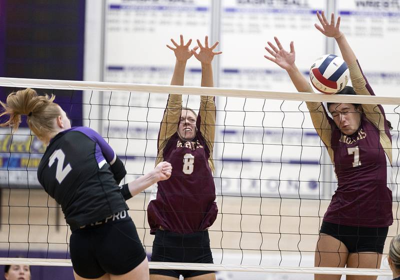 Morris’ Rosemary Misener blocks a shot against Dixon’s Madyson Tichler Thursday, Oct. 31, 2024 in the class 3A regional championship at Dixon High School.