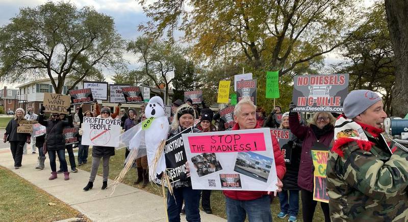Residents showed up outside Carpentersville village hall Tuesday, Oct. 18, 2022, to show their opposition to a potential development at Randall and Binnie roads.