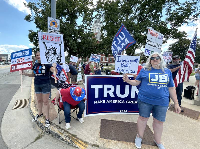 Demonstrators both for and against President Donald Trump and his policies carried signs and flags at the "Workers Over Billionaires" rally in downtown Oregon on Monday, Sept. 1, 2025.