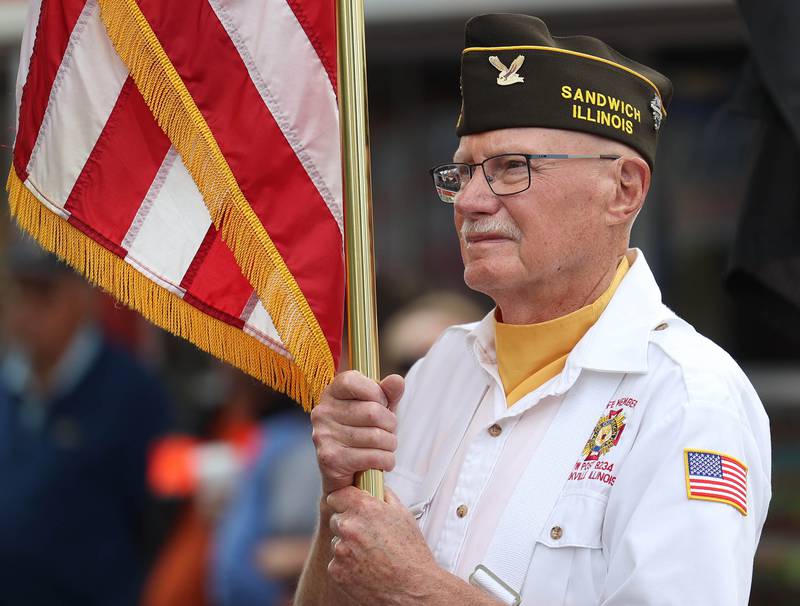 Bob Leonard, from Sandwich VFW Post 1486, holds the American flag as part of the color guard Wednesday, Sept. 3, 2025, during the opening ceremony at the Sandwich Fair.