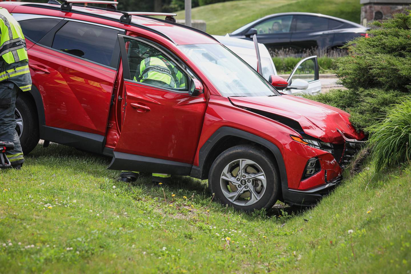 Two cars crash into a ditch on June 3, 2025 at the intersection of Country Club Road and Bull Valley Road in Woodstock.