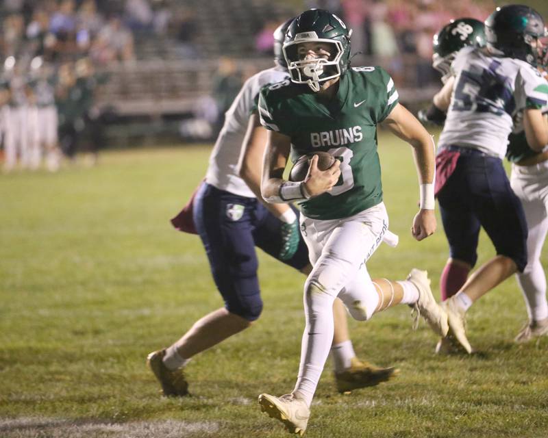 St. Bede quarterback Gino Ferrari runs the ball in to score a touchdown against Peoria Notre Dame on Friday, Oct. 17, 2025 at St. Bede Academy.