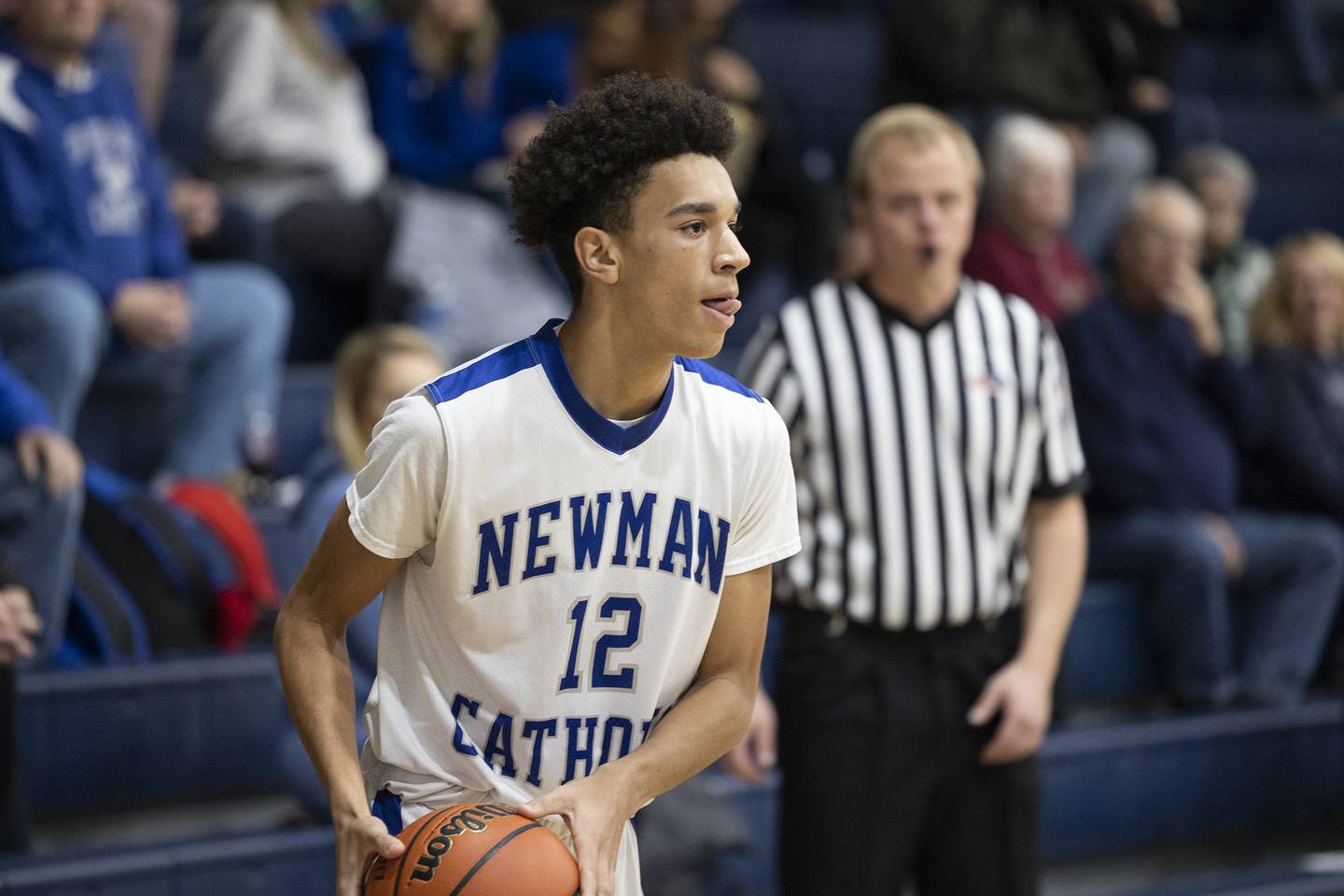 Newman’s Isaiah Williams works the ball Tuesday, Dec. 13, 2022 against Pecatonica.