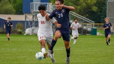 Photos: Oswego East hosts Oswego in boys soccer