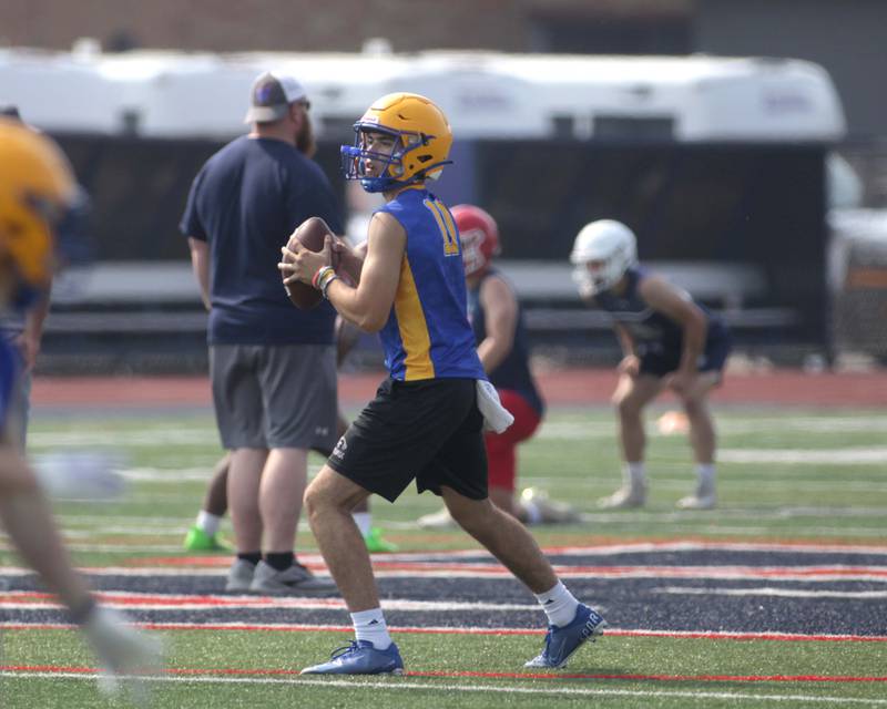 Lyons Township quarterback Dominic Pisciotti throws the ball during a 7-on-7 football tournament at West Aurora High School on Friday, June 23, 2023.
