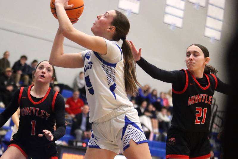 Burlington Central’s Audrey LaFleur works under the hoop against Huntley in varsity girls basketball on Monday, Feb. 9, 2026, at Central High School in Burlington.
