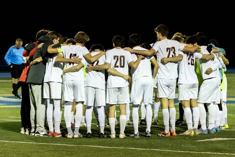 Lincoln-Way Central’s team huddles up prior to playing in a Class 3A Boys Soccer Super-Sectional game against St. Laurence at Lyons Township High School’s South Campus on Nov. 3, 2025.