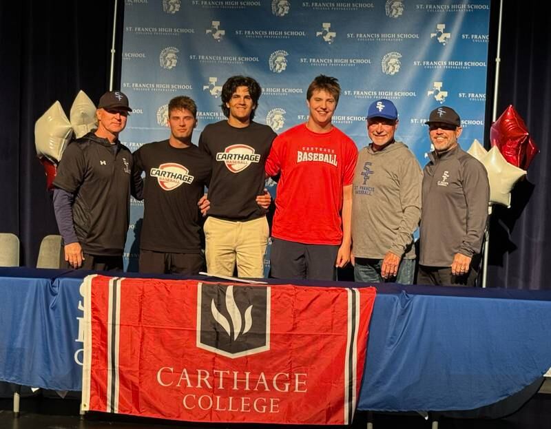 St. Francis seniors  Dylan Ston, Cole Danner and Jake Glaudel shown here signing their letters of intent with Carthage College.