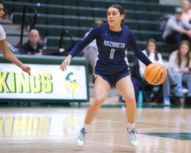 Nazareth's Allia Von Schlegell calls a play against Downers Grove North during the Dave Yates Chicagoland Showcase on Saturday, Dec7,2024 at Fremd in Palatine.