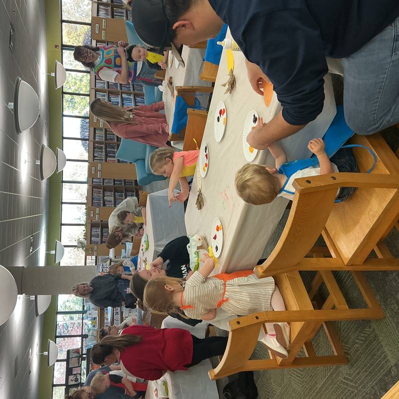 Last week, at Julia Hull District Library, toddlers gobbled-up some messy fun as they used their hands and fingers to create Thanksgiving themed works of art.