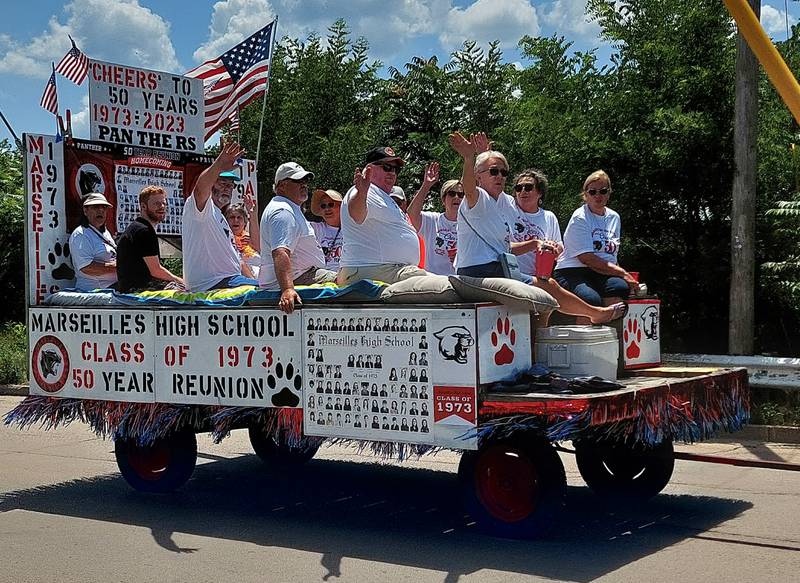 The Marseilles High School Class of 1973 ride through the Fun Days parade Sunday, July 9, 2023.