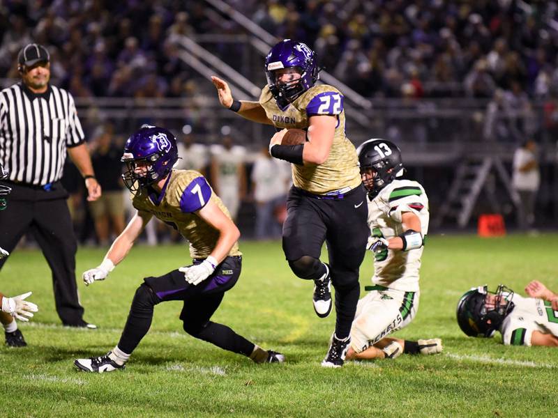 Dixon's Aiden Wiseman runs the ball on Friday, Sept. 8, 2023 at Rock Falls.