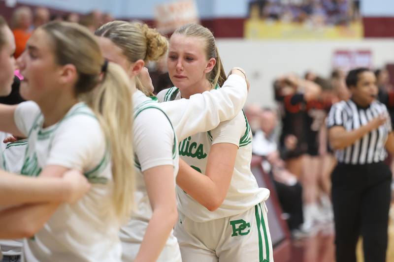 Providence’s Landrie Callahan gets hugs as she heads to the bench in the final minutes of the Celtics loss against Washington in the Class 3A Kankakee Super-Sectional game on Monday, March 3, 2026 in Kankakee.