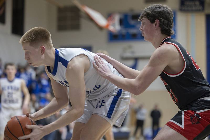 Newman’s George Jungerman looks to pass against Hall Friday, Feb. 2, 2024 at Newman High School.