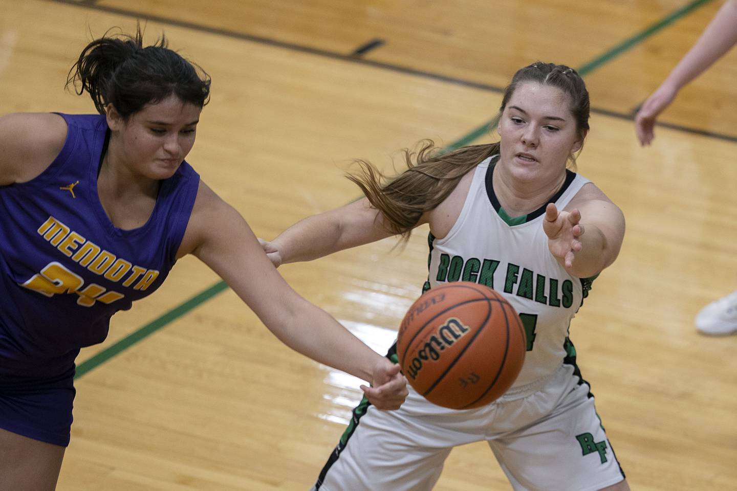 Rock Falls’ Katie Thatcher works below the basket against Mendota Saturday, Jan. 14, 2023.