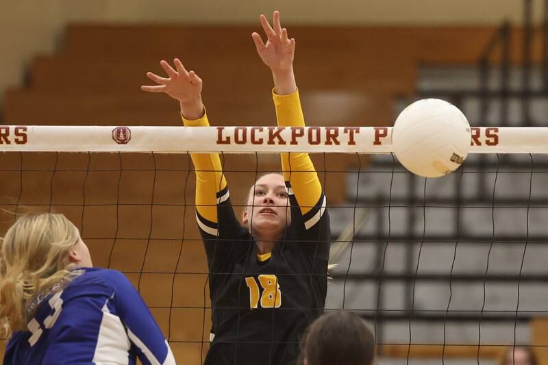 Joliet West’s Peyton Darguzis blocks a shot against Sandburg in the in the Class 4A Lockport Sectional title match on Wednesday.