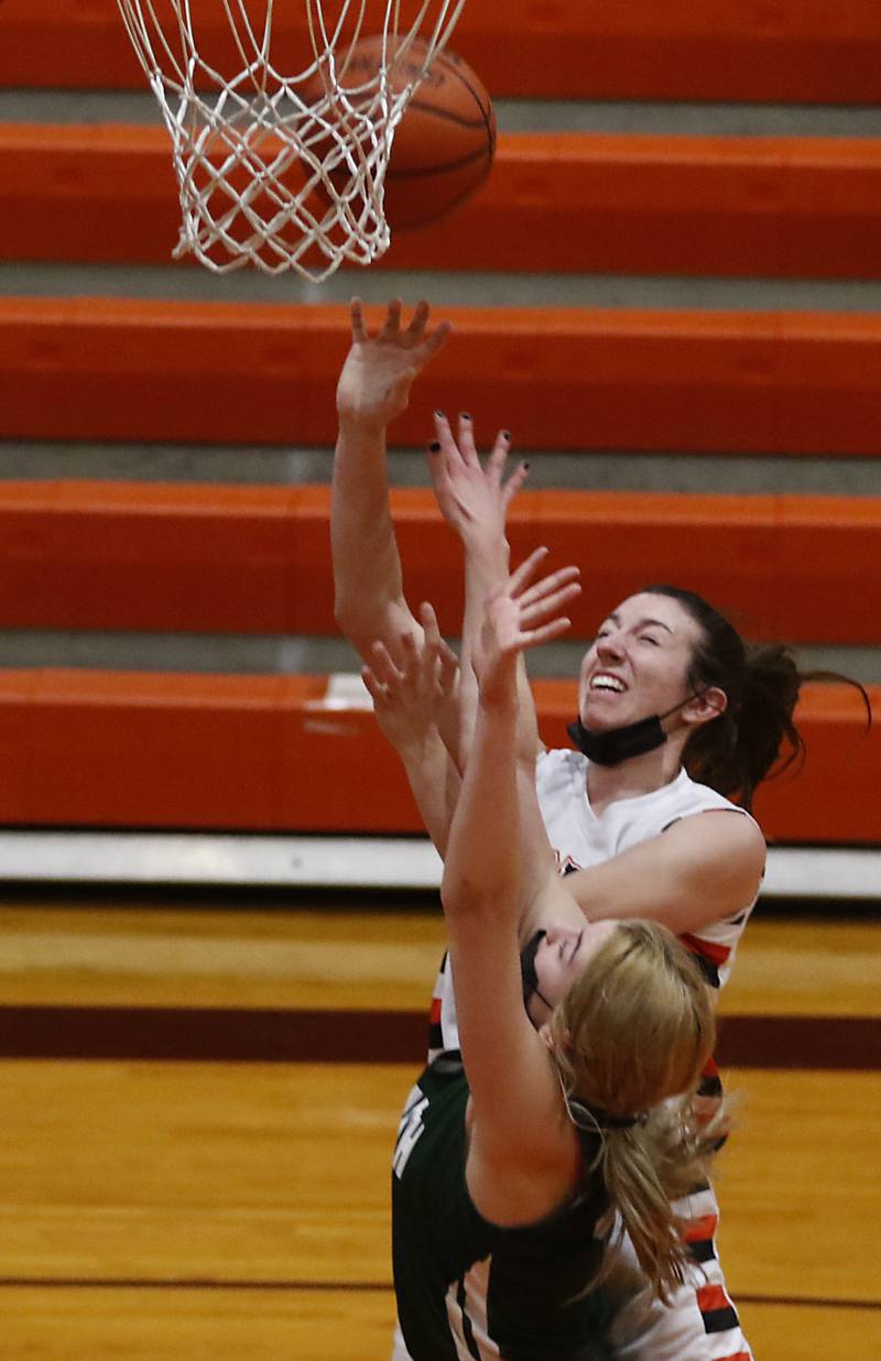 Crystal Lake Central's Paige Keller is founded by Crystal Lake South's Hanna Massie during a Fox Valley Conference game Wednesday, Jan. 26, 2022, between Crystal Lake South and Crystal Lake Central at Crystal Lake Central High School.