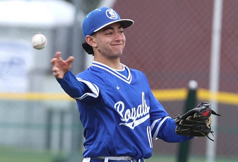 Hinckley-Big Rock's Josh Badal gets the ball back into the infield after catching a fly ball during their game Monday, May 1, 2023, at Indian Creek High School in Shabbona.