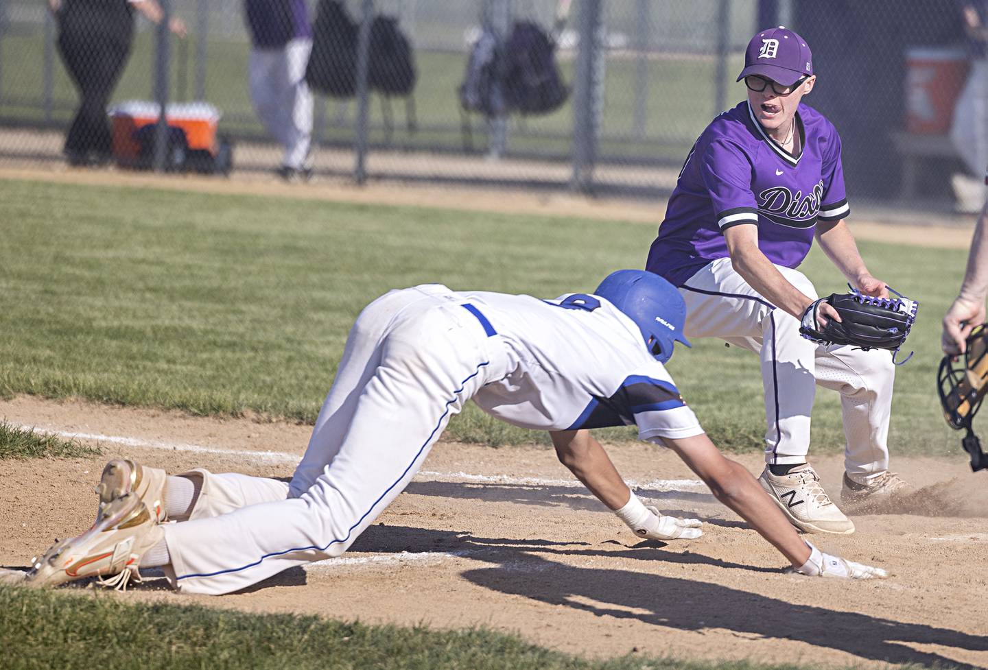 Burlington Centrals’ AJ Payton is tagged out at home by Dixon’s James Leslie Thursday, May 25, 2023 during a class 3A regional semifinal in Rochelle.