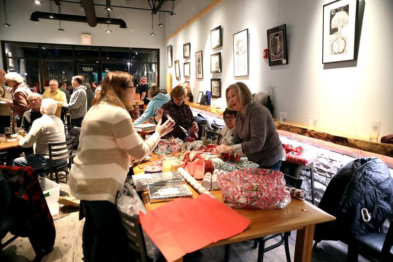 The Batavia Rotary Club hosted a gift wrapping party for clients of the Association for Individual Development (AID) on Thursday, Dec. 12, 2024 at Brother Chimp Brewing in North Aurora.