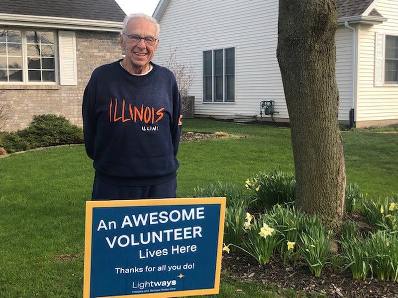 Last week Lightways Hospice and Serious Illness Care in Joliet honored its 120 volunteers by placing signs in the volunteers yards for National Volunteer Appreciation Week 2022. Pictured is Larry Kelly.