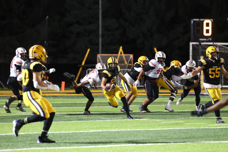 St. Laurence's Noah Taylor runs the ball against Bradley-Bourbonnais during the Vikings 35-21 victory over Bradley-Bourbonnais in second round playoff on Friday, Nov. 7, 2025.
