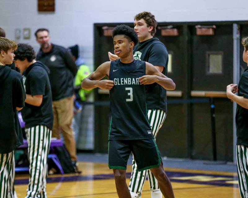 Glenbard West's TJ Williams (3) is introduced before their basketball game between Glenbard West at Downers Grove North. Jan 24, 2025 in Downers Grove.