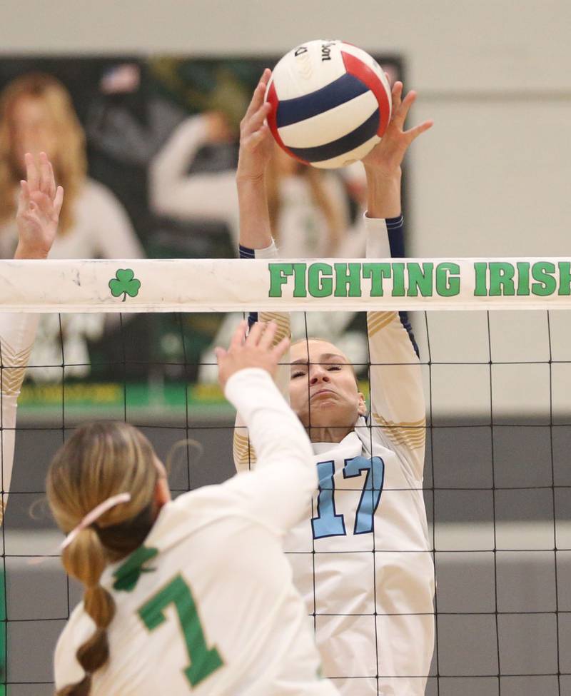 Marquette's Avery Durdan blocks a spike from Seneca's Audry McNabb on Thursday, Sept. 19, 2024 at Seneca High School.
