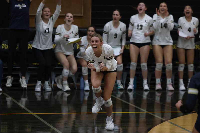 Lemont’s April Rice celebrates a point against St. Laurence in the Class 3A St. Laurence Sectional championship on Thursday, Nov. 7, 2024 in Burbank.