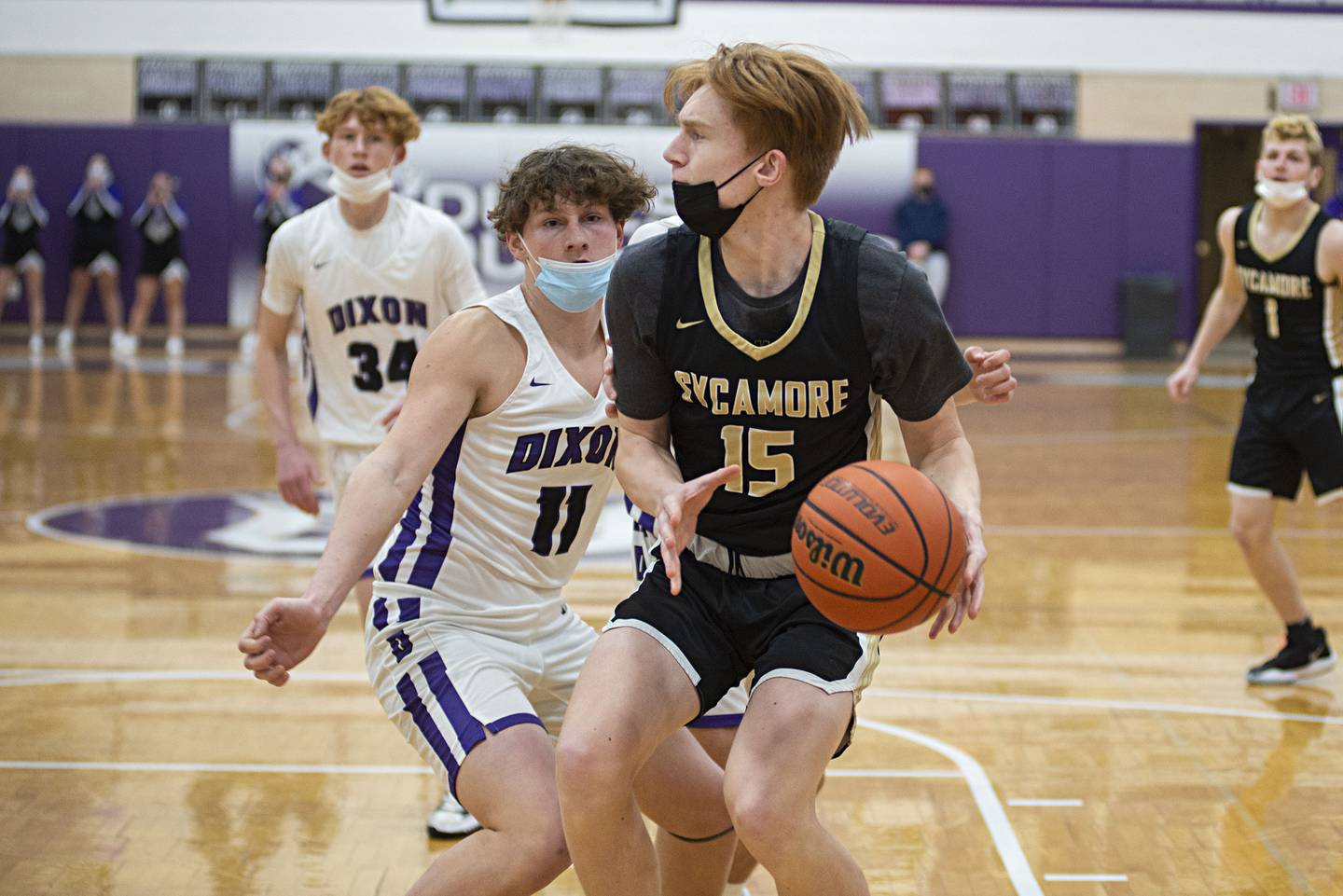 Sycamore's Teague Hallahan drives the baseline against Dixon on Tuesday, Jan. 25, 2022.