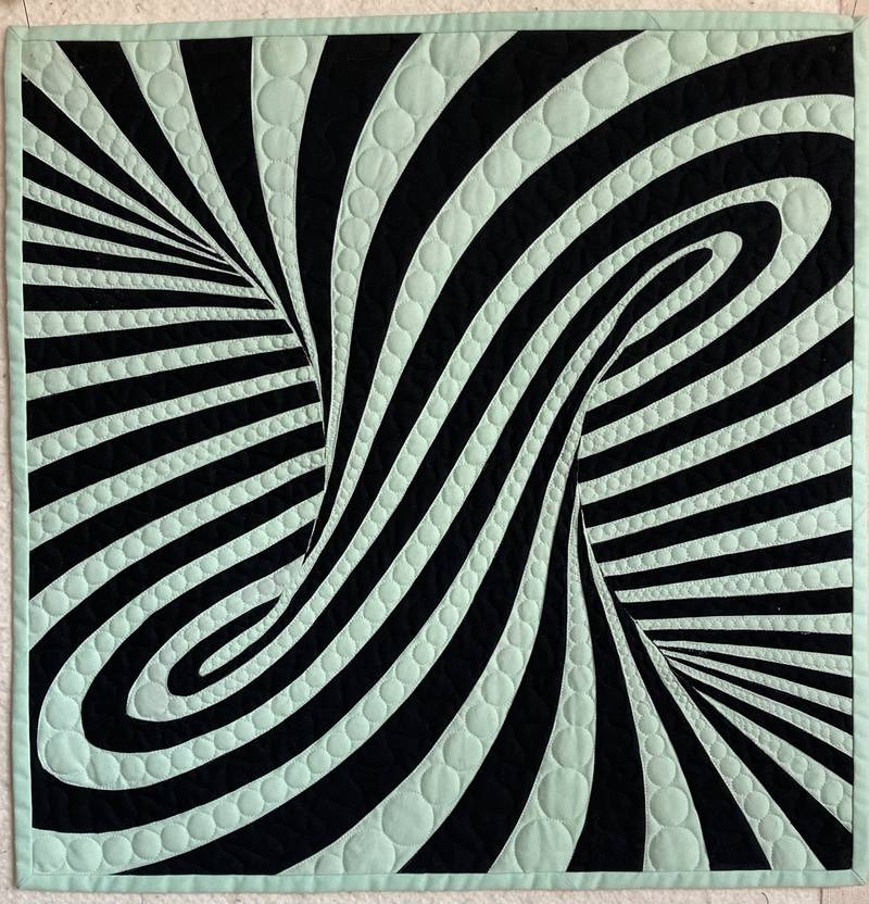 Local quilter, Gary Riss, has one of his quilts at the current QuiltCon Quilt Show.