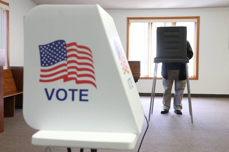 A voter casts their ballots in Bourbonnais at The Grow Center on Tuesday, April 1, 2025. The mayoral race between current Bourbonnais trustee Jeff Keast and opponent David Zinanni will yield a new mayor in the village.