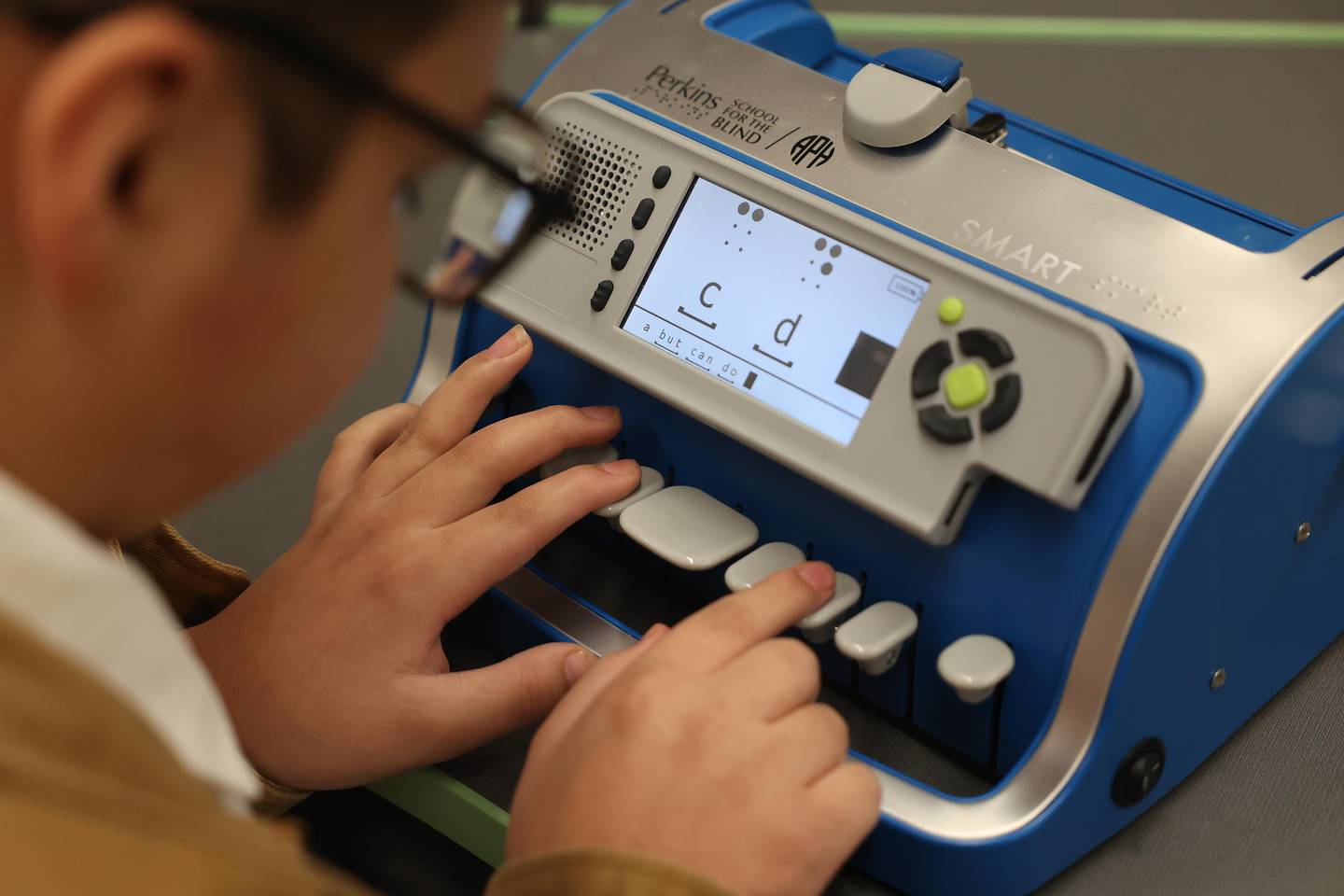 Angel Rodriguez Vazquez works on his Perkins SMART Brailler on the first day of school at Dirksen Junior High School on Wednesday, August 21, 2024 in Joliet.