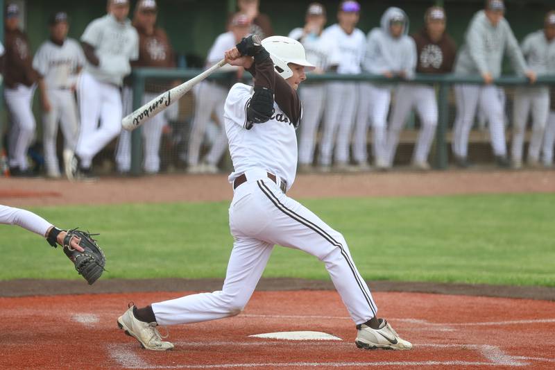 Joliet Catholic’s Johnny Curbis connects for a single against Nazareth on Wednesday, April 29, 2026 in Joliet.