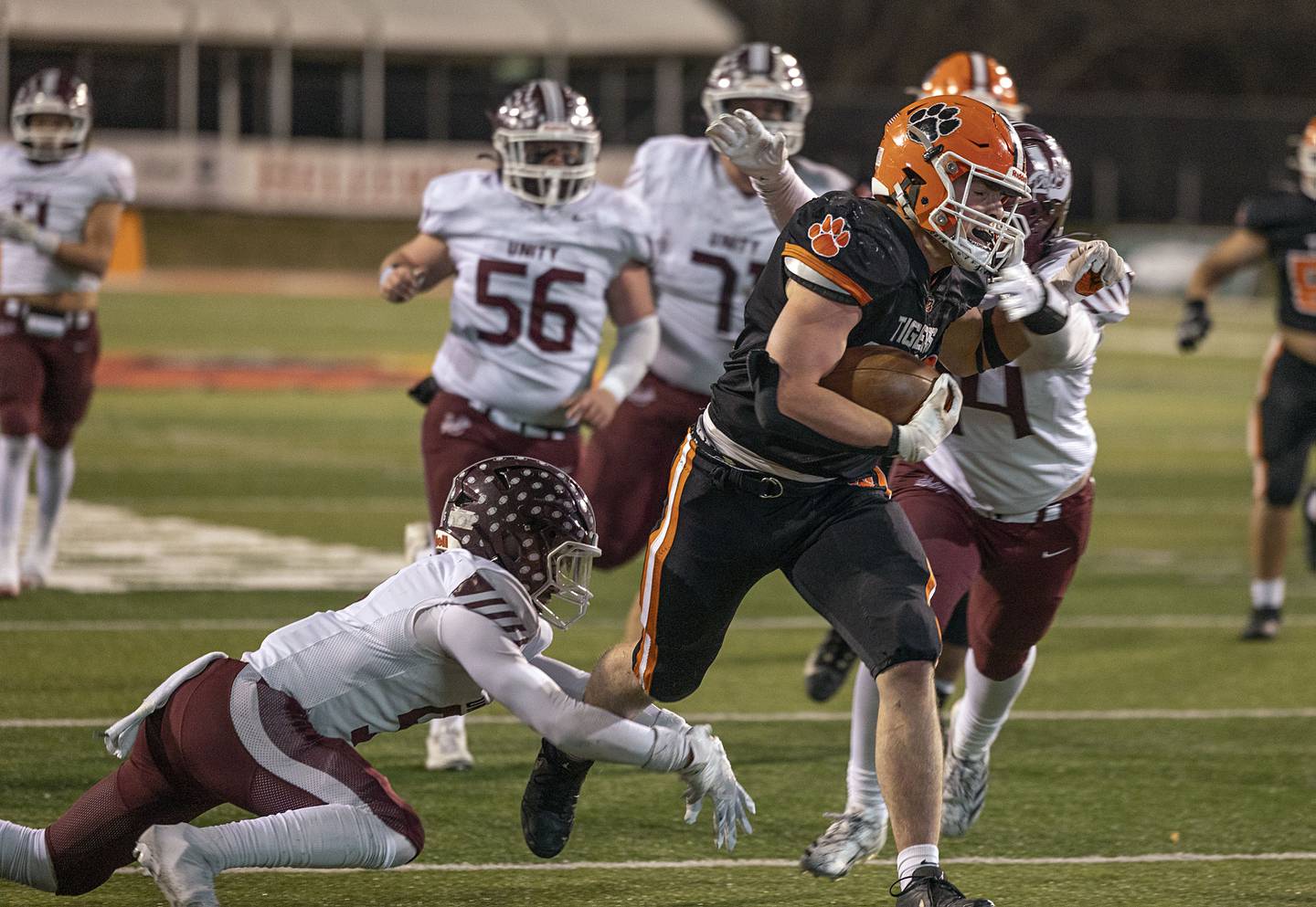 Byron’s Caden Considine fights for yards against Tolono-Unity Friday, Nov. 28, 2025, in the Class 3A football finals at Hancock Stadium at ISU.