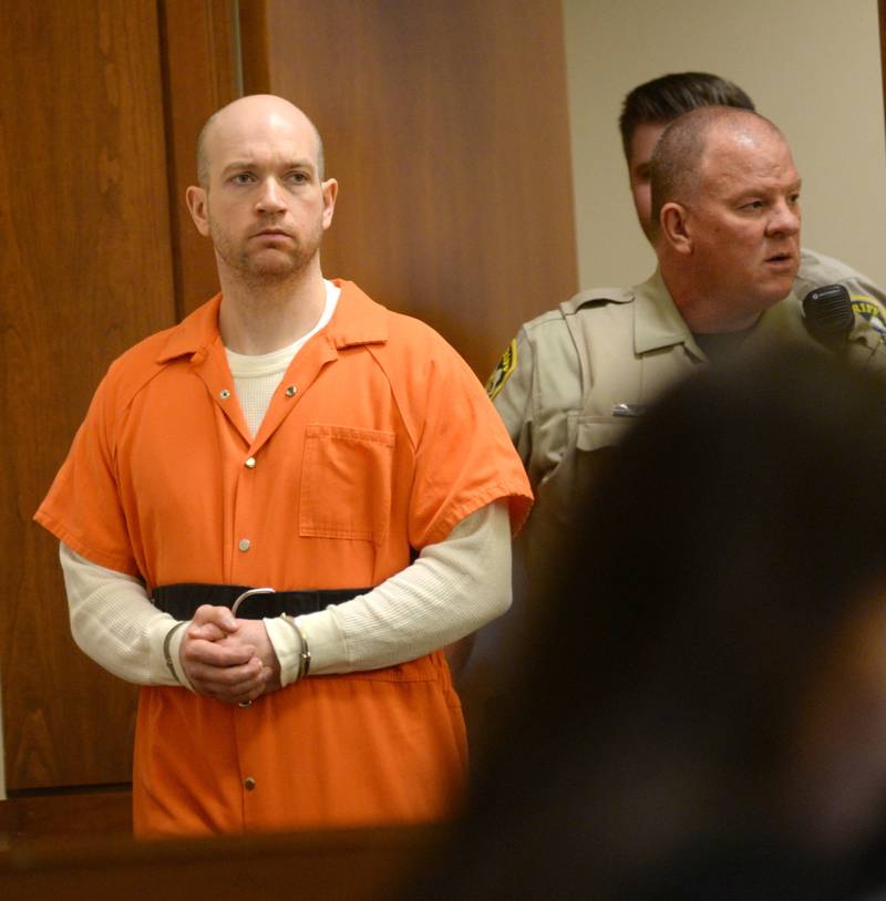 Matthew T. Plote is escorted into an Ogle County courtroom on Thursday, June 1 for a status hearing, He is charged with killing Melissa Lamesch and her unborn child in November 2021.