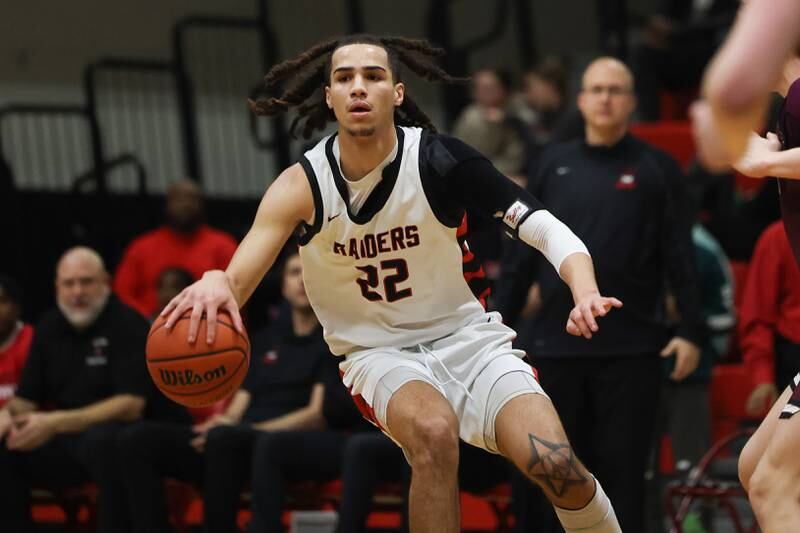 Bolingbrook’s Donaven Younger looks for a play against Lockport on Friday, February 10th.