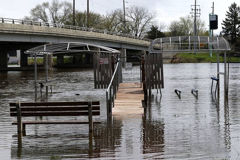 Partially submerged docks near Francis M. Schmitt Park in Johnsburg on Sunday, April 19, 2026, as the Fox River continues to rise.
