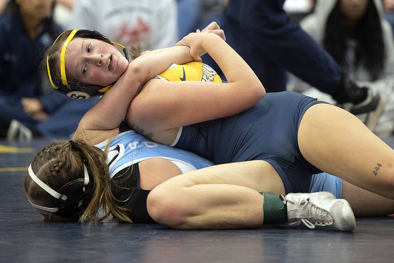 Sterling’s Skyann Munz works on the arm of Plainfield South’s Lexi Kachiroubas in the 130 pound finals Saturday, Dec. 7, 2024, at the Carson DeJarnatt Invitational. Munz took the win.