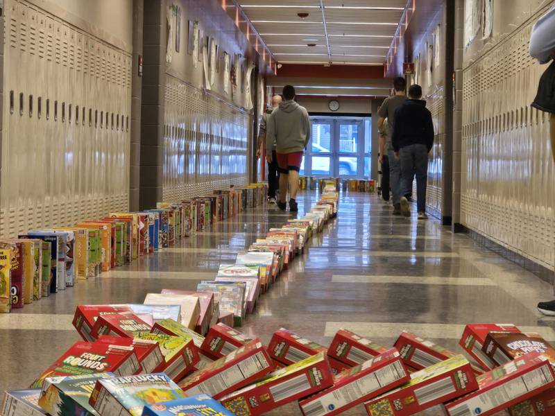 Streator FFA students follow cereal boxes as they tumble Tuesday, March 18, 2025, in the hallways of Streator High School.