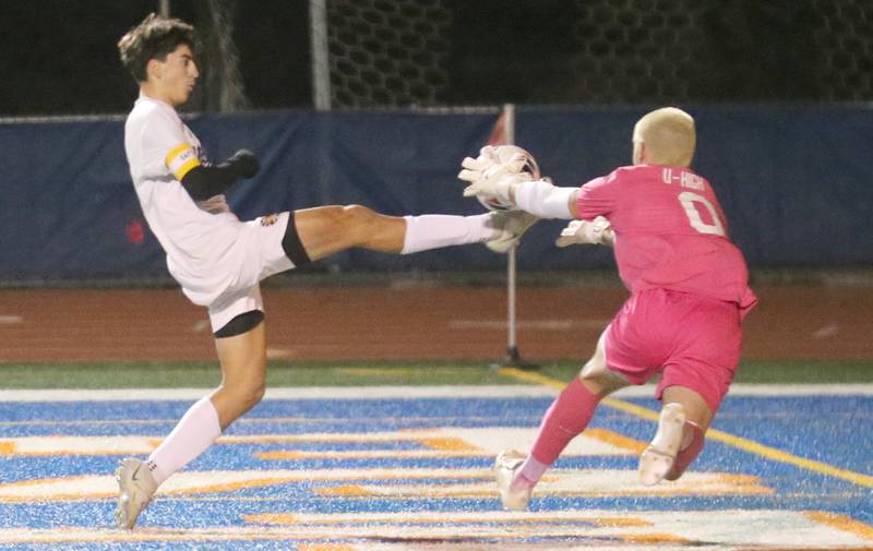 Mendota's Johan Cortez's shot is blocked by Normal U-High keeper Noah Grieshaber during the Class 1A State semifinal game on Thursday, Nov. 7, 2024 at Hoffman Estates High School.