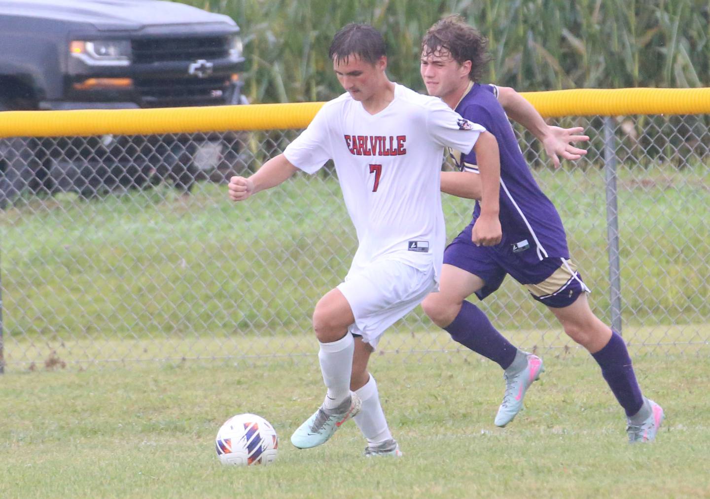 Earlville's Darik Farley, runs down the field as Serena's Thomas Peverill chases after him on Wednesday, Sept. 3, 2025 at Serena High School.