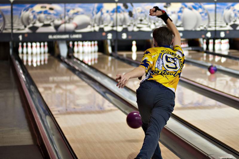 Sterling's Andrew Doughty fires the ball down the lane during bowling regionals in Sterling on Saturday, Jan. 15, 2022.