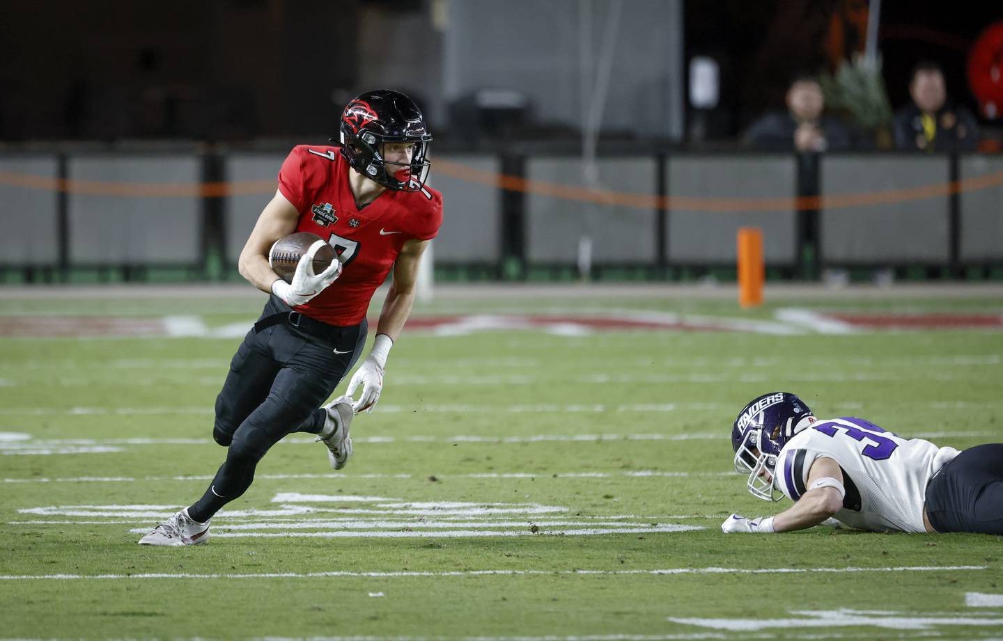 North Central College receiver and Hinsdale Central graduate Thomas Skokna (7) runs with the ball during the Stagg Bowl against Mount Union.