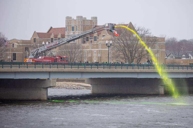 The Dixon Fire Department turns the Rock River green at the start of the Rock River Valley Shamrock Club’s St. Patrick's Day parade on Saturday, March 18.