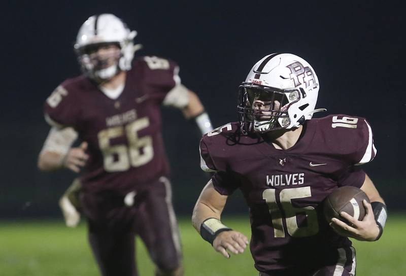 Prairie Ridge's Dominic Creatore runs with the ball during a Fox Valley Conference football game against Crystal Lake Central  on Friday, Oct. 13, 2023, at Prairie Ridge High School in Crystal Lake.