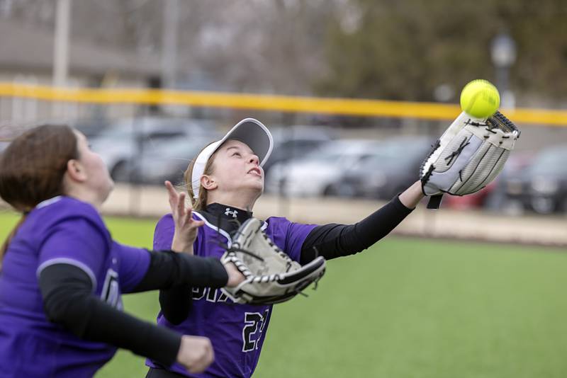 Dixon’s Kennedy Haenitsch reaches but comes up short on a pop foul Tuesday, March 21, 2023 against Sterling.