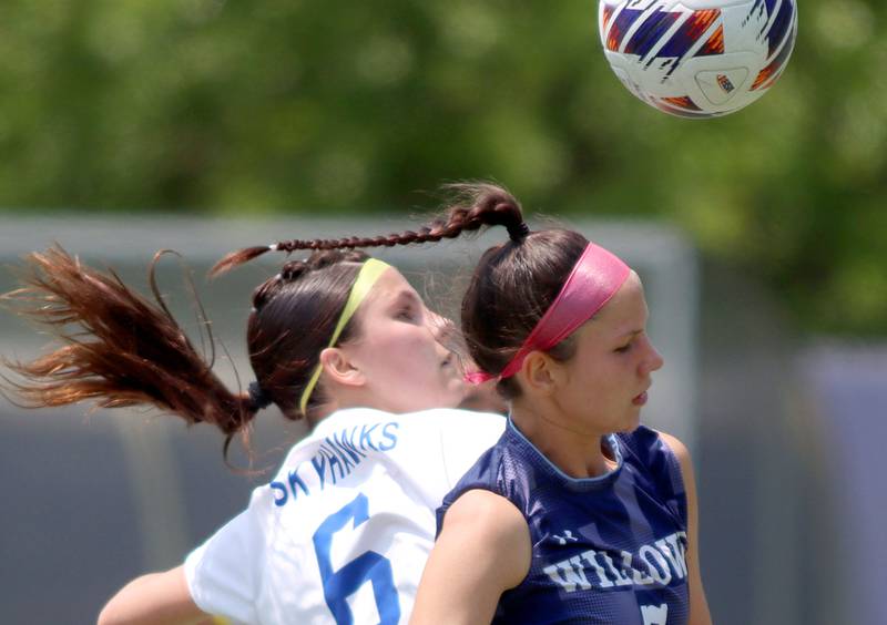 Johnsburg’s Liz Smith, back, battles Willows Academy’s Erin Mongoven in IHSA Class 1A Supersectional soccer action at Dominican University in River Forest on Saturday, May 31, 2025.